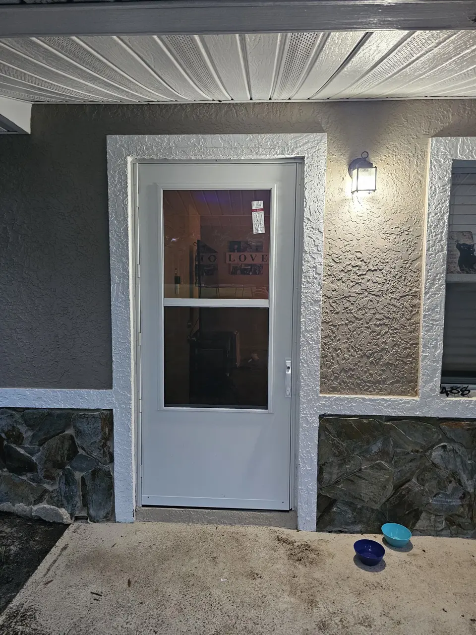 Finished exterior door and painted entry